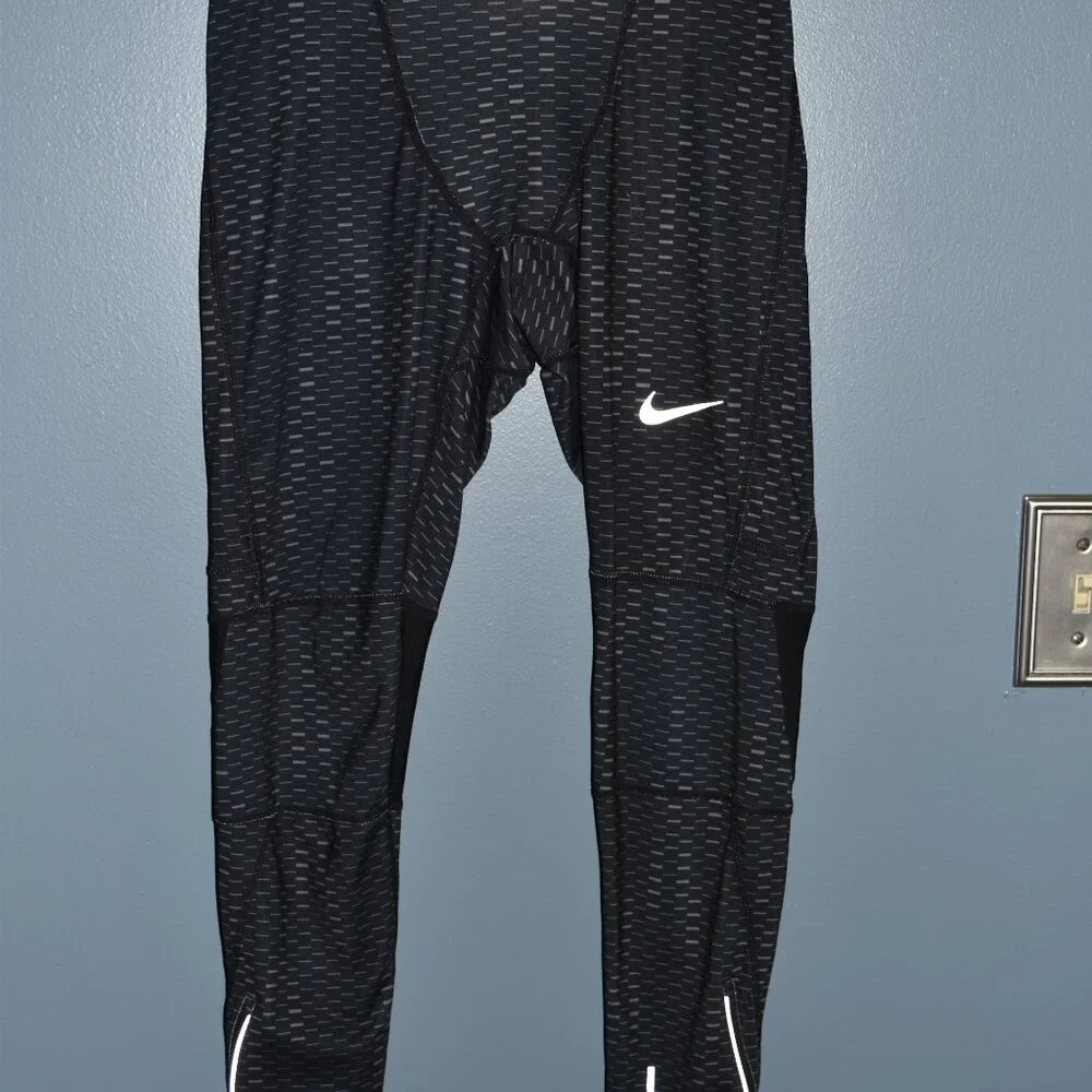 Nike Dri-Fit running tights size Small‎
